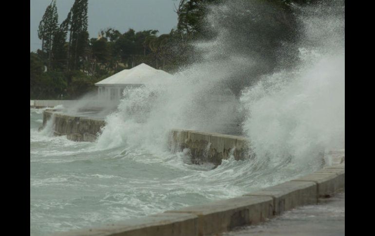 El huracán que llegó el miércoles a la isla en categoría cinco cobró la vida de tres personas. AP / T. Aylen