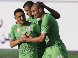 Karin Ziani celebra su gol con sus compañeros. AP  /