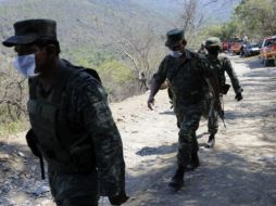 Se han tomado muestras de sangre para identificar los cuerpos encontrados en la fosa. NTX  /