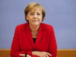 Merkel se vio obligada a aprobar medidas económicas tras la crisis griega. AP  /