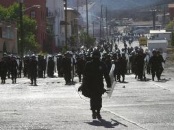 Elementos de la Policía Federal en la ciudad de Cananea, tras haber desalojado a trabajadores sindicalizados. REUTERS  /