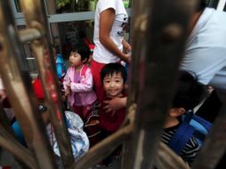 Estiman que la población china llegará a los mil 400 millones de habitantes en el 2026, luego decrecerá. EFE  /