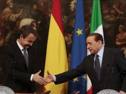 El político italiano se despidió de su par español entre bromas. AP  /