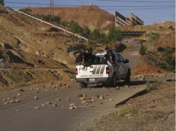 Mientras los policías mantengan sitiada la ciudad, estará el riesgo de estos choques. REUTERS  /