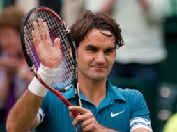 El tenista suizo Roger Federer, festeja su triunfo. EFE  /
