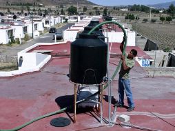 Hasta antes del martes 8 de junio, los habitantes del Fraccionamiento Residencial San Antonio se abastecían con pipas. E. PACHECO  /