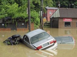 Los condados de Logan, McDowell, Mingo y Wyoming, reportan graves inundaciones debido al temporal. AP  /