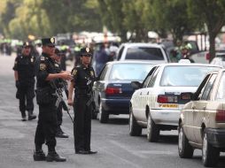 Elementos de seguridad, en operativo para localizar a los sicarios que emboscaron a policías Federales en Michoacán. EL UNIVERSAL  /