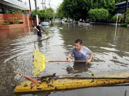 El Ayuntamiento de Tlaquepaque inició hoy con la reubicación de familias que habitan en zonas de alto riesgo de inudación. ARHICVO  /