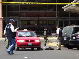 Un enfrentamiento entre dos bandas enTepic, dejó siente sicarios y un elemento de seguridad muertos. EL UNIVERSAL  /