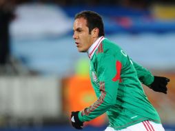 El delantero Cuauhtémoc Blanco, celebra tras anotar contra Francia. AFP  /