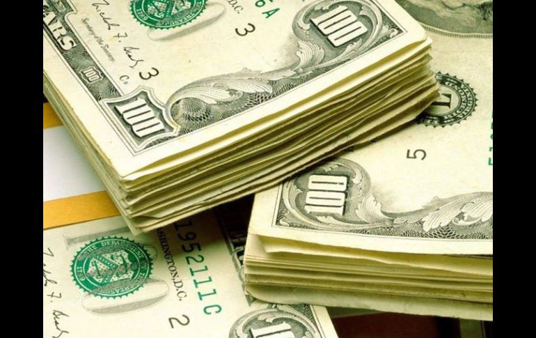 Empresarios del sector turístico manifiestan su inconformidad ante las medidas restrictivas para la compra venta de dólares. ESPECIAL  /