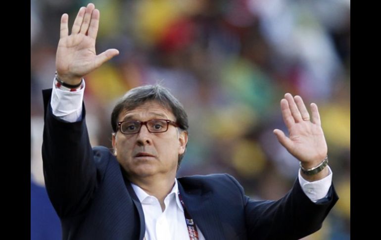 El técnico Gerardo Martino durante el partido contra Eslovaquia. AP  /