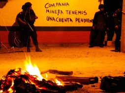 Autoridades custodian en San José del Progreso el lugar donde los funcionarios fallecieron tras ser atacados. EFE  /