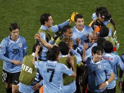 La Selección de Uruguay festeja la victoria ante México. REUTERS  /