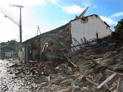 La crecida de los ríos Mundaú y Paraíba por las lluvias dejó bajo las aguas una decena de ciudades de esa región. EFE  /
