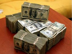 El mínimo a la compra del billete verde es de 11.80 pesos. ARCHIVO  /