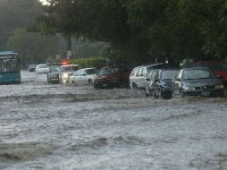 La lluvia de esta noche en la Zona Metropolitana de Guadalajara ha ocasionado inundaciones de hasta 40 centímetros. ARCHIVO  /