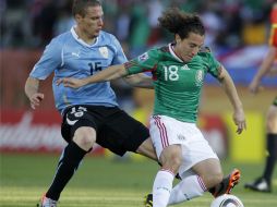 La salida de Andrés Guardado en el partido contra Uruguay fue muy polémica. AP  /