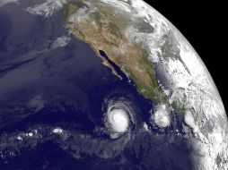 Por el huracán Darby en el Pacífico, hay alerta verde en la fase de acercamiento en Oaxaca, Guerrero y Michoacán. AFP  /