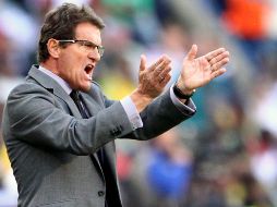 Fabio Capello da instrucciones a sus jugadores durante el partido de octavos contra Alemania. EFE  /