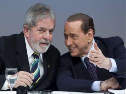 El presidente brasileño, y el primer ministro italiano, conversan en el auditorio de la Federación de Industrias del Estado. EFE  /