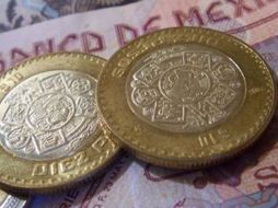 En la categoría interbancaria se ubicó en 13.10 por dólar. ARCHIVO  /