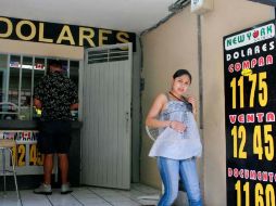 La restricción para depósitos en dólares ahogará a las agencias de viajes. ARCHIVO  /