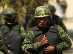 Los hermanos de apellido Almanza pudieron haber muerto a causa de tiros directos de militares. AFP  /