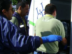 Las bolsas fueron levantadas por personal del semefo para determinar las causas de muerte. ARCHIVO  /