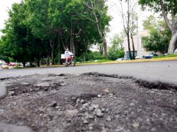 El problema de los baches afecta tanto a Tlaquepaque como a Guadalajara y Zapopan. A. GARCÍA  /