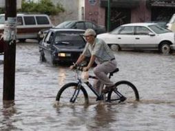 Se continúa con la limpieza de algunas de las vialidades inundadas. ARCHIVO  /