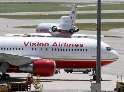 Los aviones aterrizaron con minutos de diferencia y se estacionaron frente a frente. AP  /