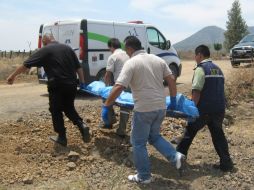 Peritos del IJCF se encargaron de levantar los cuerpos. ARCHIVO  /