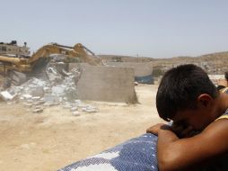 Palas mecánicas destruyeron seis construcciones, incluso tres viviendas sin terminar. REUTERS  /