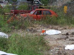 La narcofosa fue localizada en un local de grúas. NTX  /