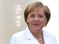 El gobierno encabezado por Angela Merkel. espera un crecimiento para todo el año muy superior a un 2 por ciento. EFE  /