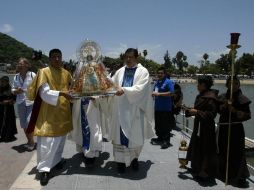 La virgen de Zapopan fue llevada a Chapala, para pedir que este temporal de lluvias sea favorable para el lago. E. BARRERA  /