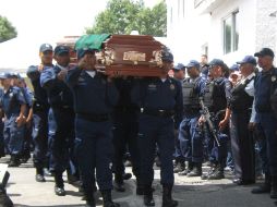 Jorge Arturo Díaz Chávez, fue homenajeado por su compañeros y familiares en la base de la Policía de Tlaquepaque. O. RUVALCABA  /