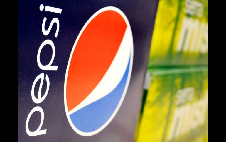 La compañía refresquera, aumentó sus ganancias operacionales. AP  /