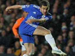 Joe Cole jugará con el Liverpool durante las siguientes cuatro temporadas. AP  /