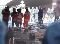 Para evitar el pánico los organizadores decidieron no suspender las actividades y dejar que se evacuara el lugar con calma. EFE  /