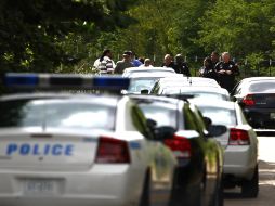 La policía cercó la escena del crimen donde se encontró el cuerpo de Lorenzen Wright. AP  /