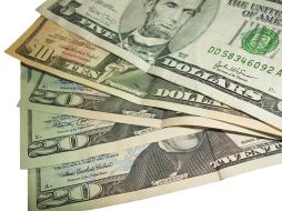 La dvisa se ubicó en 12.70 pesos por dólar. ESPECIAL  /