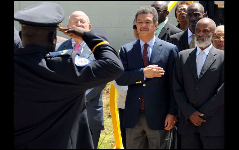 René Préval, junto a su homólogo dominicano, Leonel Fernández. AP  /
