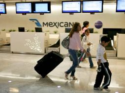 SHCP no hará rescate para Mexicana. AP  /
