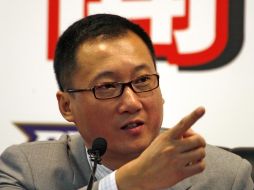 El chino millonario Kenny Huang anda tras el Liverpool desde 2008. AP  /