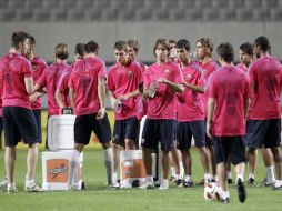 Los jugadores del Barcelona durante un entrenamiento en Seúl. AP  /