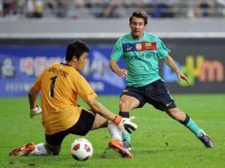 Foto de acción de uno de los dos goles que anotó Lionel Messi. AP  /