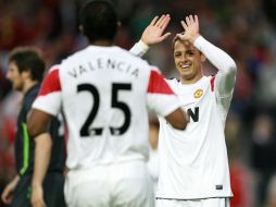Javier 'Chicharito' Hernández (der.) celebra la anotación de este miércoles con el Manchester United. AFP  /
